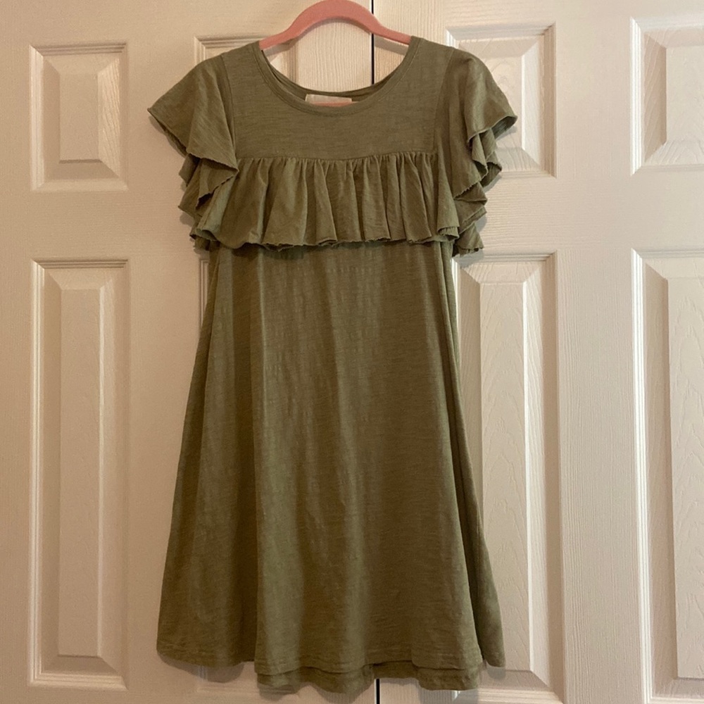 The Impeccable Pig. Small. Light olive green.